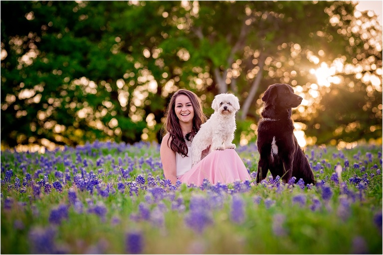 Woman and her Dogs in Bluebonnets in Austin Texas