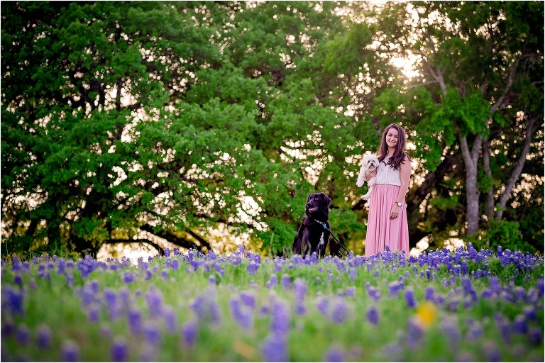 Woman and her Dogs in Bluebonnets in Austin Texas