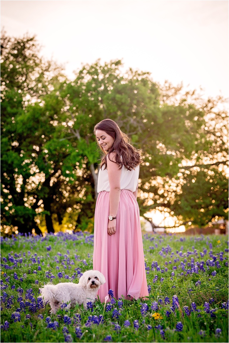 Woman and her Dogs in Bluebonnets in Austin Texas