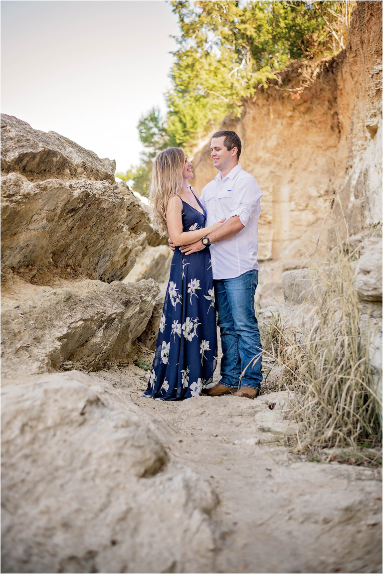 Engagement Photoshoot of couple in Austin Texas by rocks