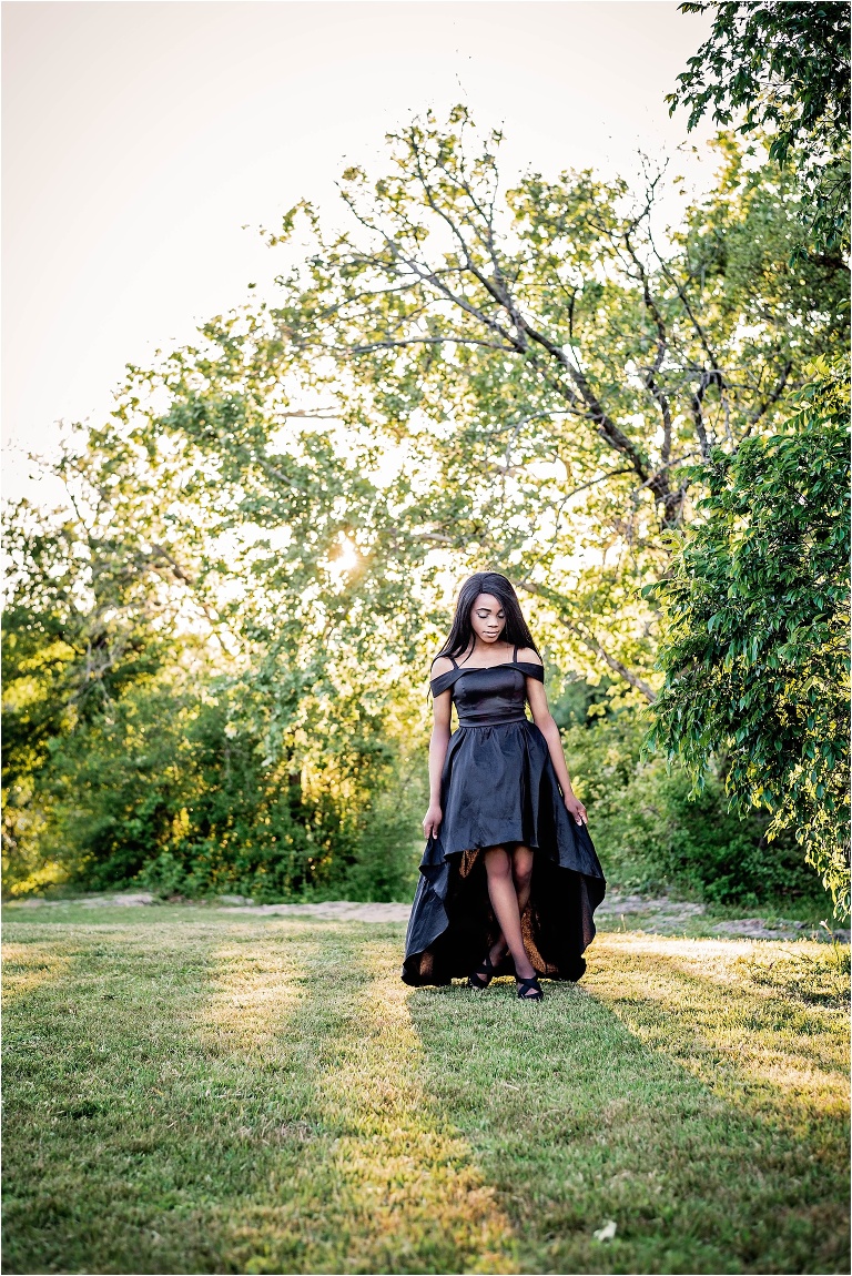 Girl in black dress for Senior Portrait Photoshoot in Round Rock Texas by Natural Light Photographer