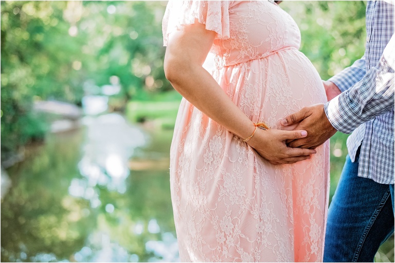 Beautiful Couple near Creek during Maternity Photoshoot in Pflugerville Texas by Natural Light Family Photographer