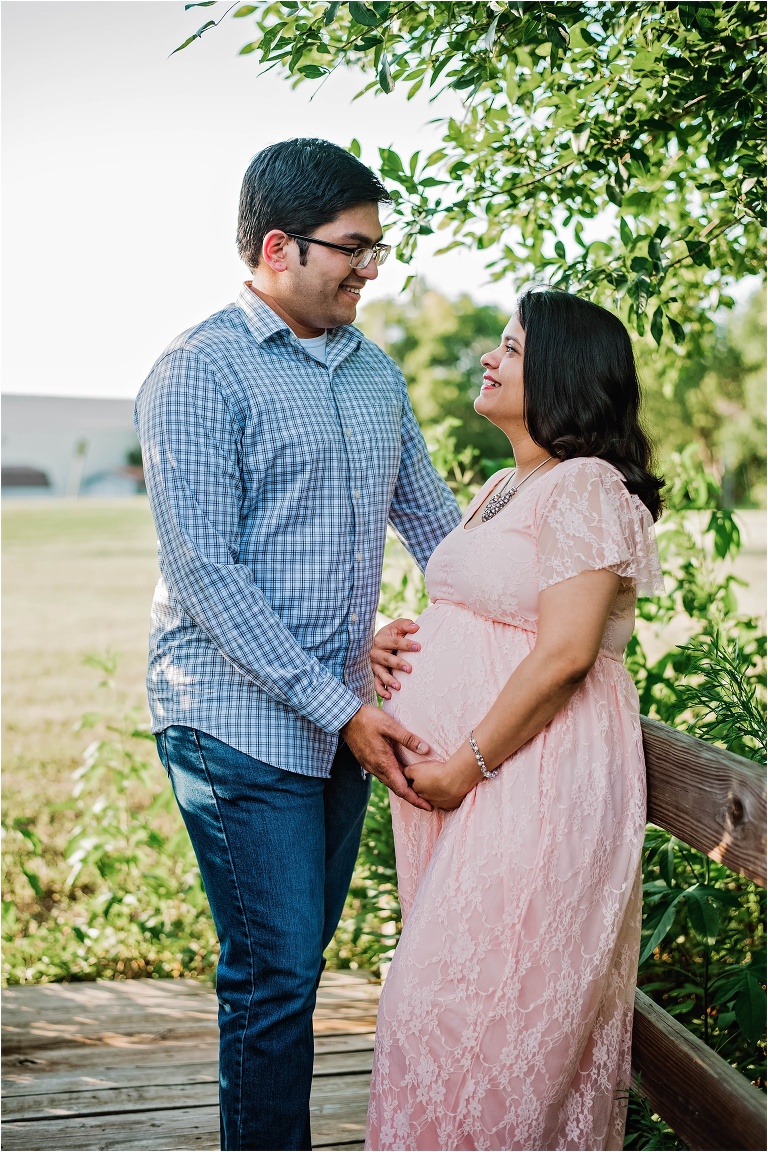 Couple Maternity Photoshoot on bridge in Austin Texas by Natural Light Photographer