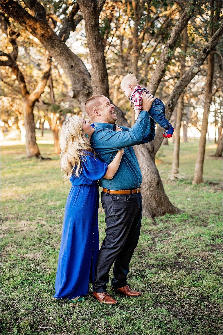 Beautiful family of four in Leander Texas Christmas photoshoot by natural light photographer