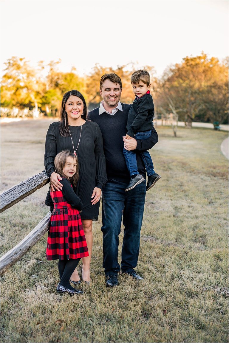 Family of four in Pflugerville Texas for Christmas portraits by natural light photographer