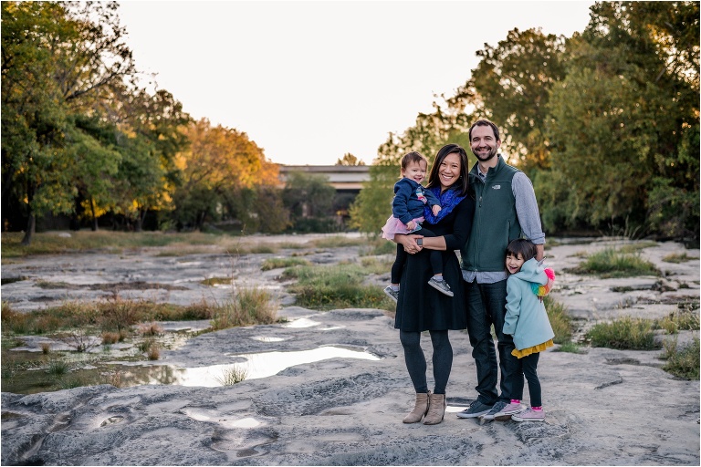 Family of four in Round Rock Texas during morning Christmas photoshoot by natural light portrait photographer