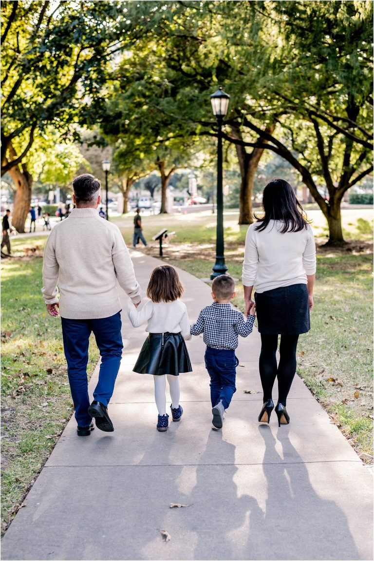 Beautiful family of four at Texas State Capital in Austin TX by natural light family portrait photographer