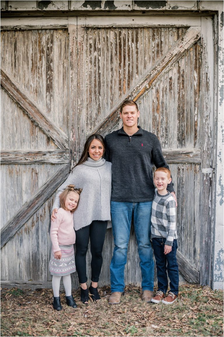 Family of four in Georgetown Texas during Christmas Mini Photoshoot by natural light children photographer twin boys