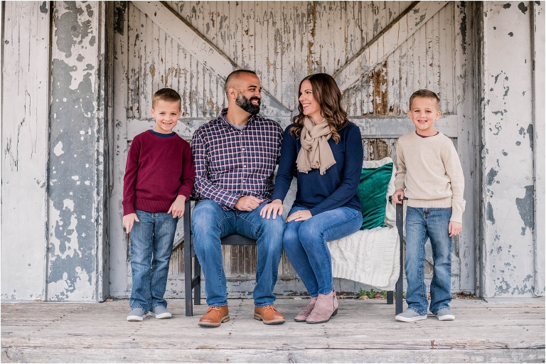 Family of four in Georgetown Texas during Christmas Mini Photoshoot by natural light children photographer twin boys