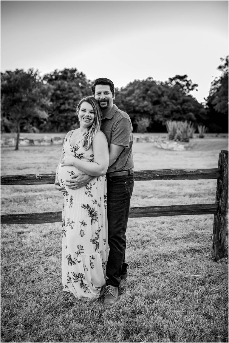 Couple during photoshoot in Pflugerville Texas by natural light maternity portrait photographer