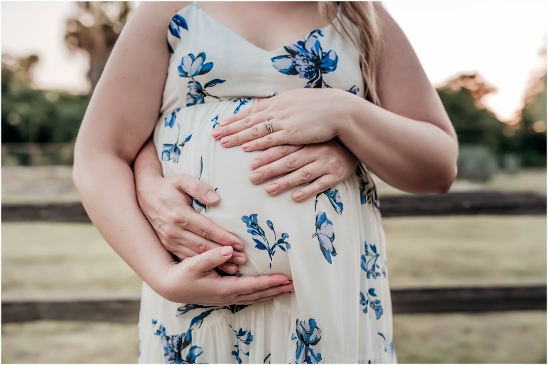 Couple during photoshoot in Pflugerville Texas by natural light maternity portrait photographer