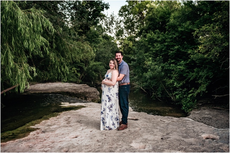 Couple during photoshoot in Pflugerville Texas by natural light maternity portrait photographer