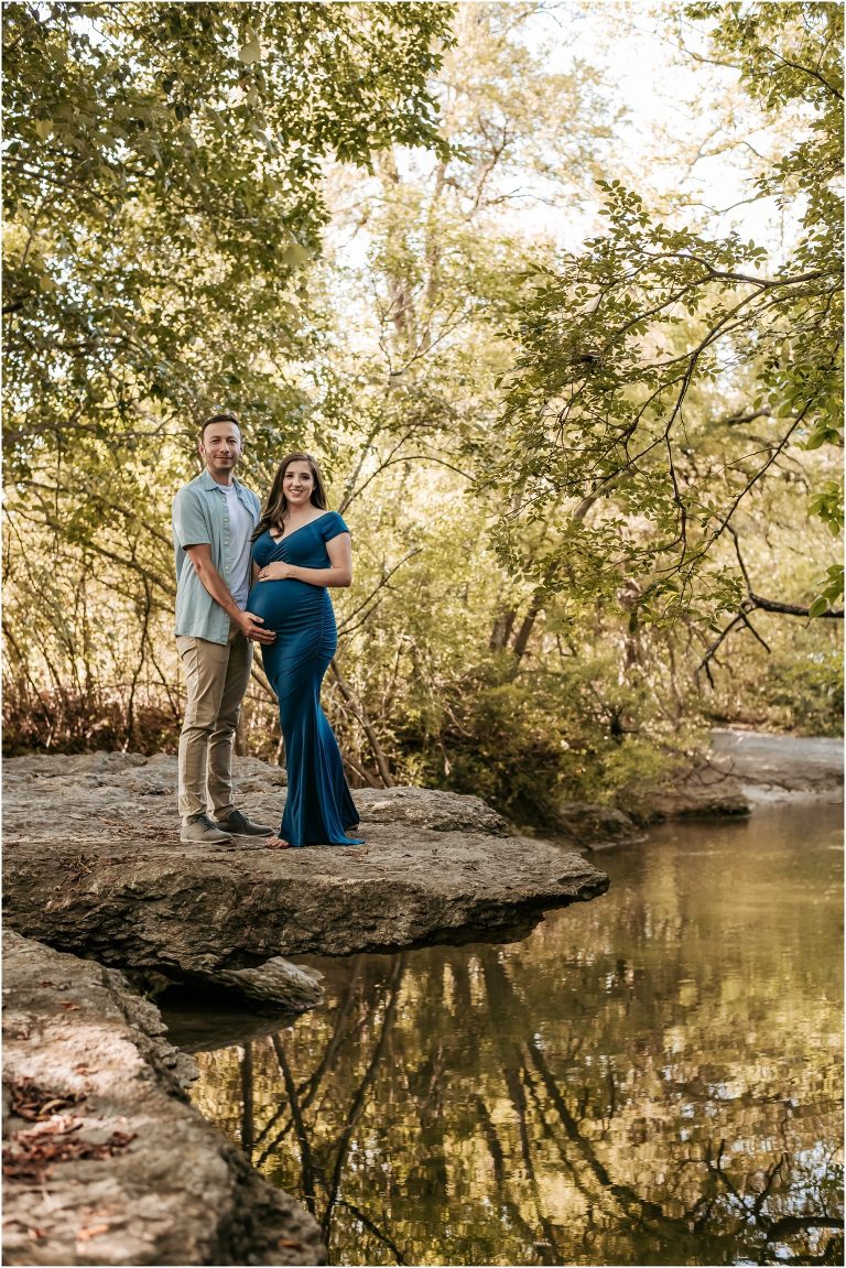 Couple snuggled together during maternity session by natural light photographer in Pflugerville Texas